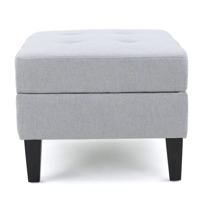 Otomano tapizado acolchado de almacenamiento de color gris claro con patas de madera de abedul