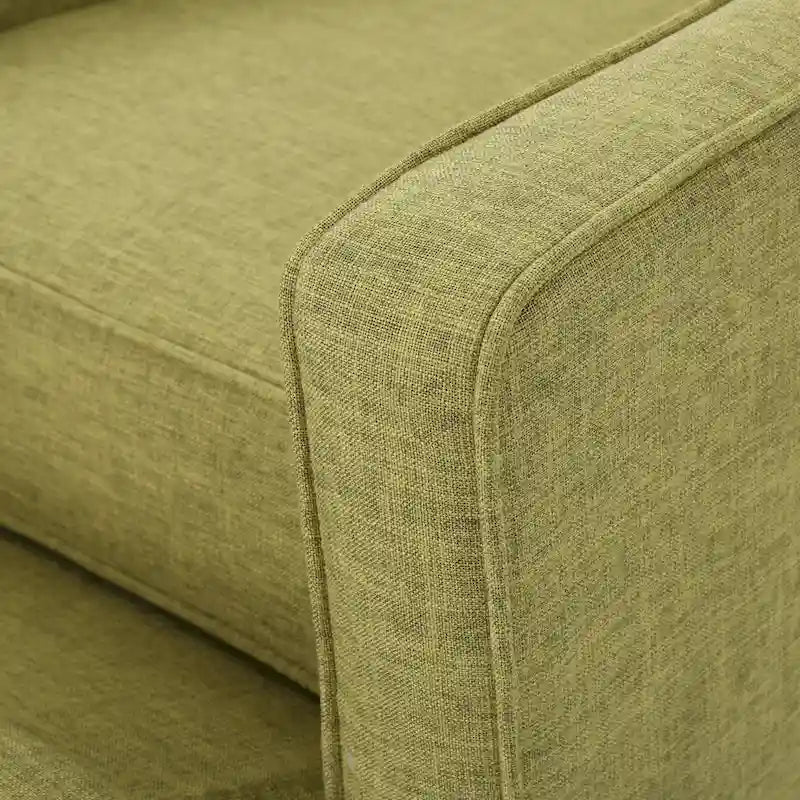 Groene stoffen gecapitonneerde relaxfauteuil met naar achteren te duwen rugleuning en taps toelopende poten van beukenhout