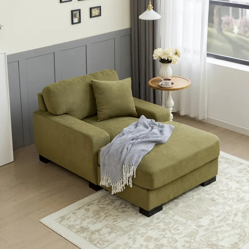 Chaise longue tapizada moderna con brazos acolchados y patas de madera