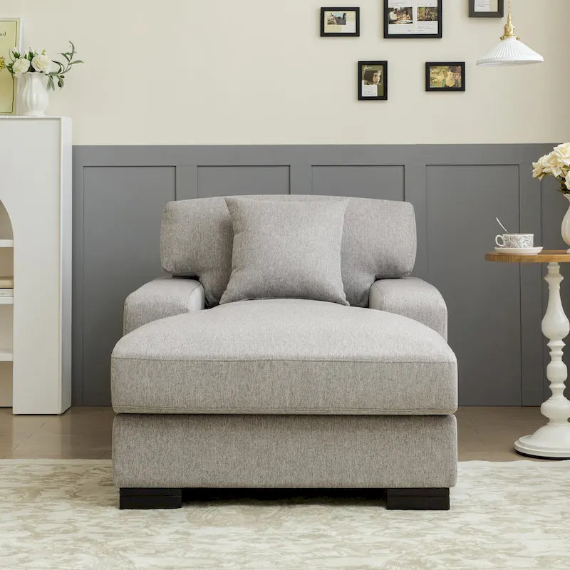 Chaise longue tapizada moderna con brazos acolchados y patas de madera