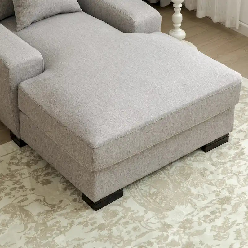 Chaise longue tapizada moderna con brazos acolchados y patas de madera