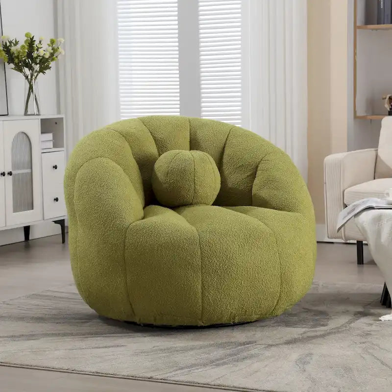 Sillón tipo puf redondo tapizado, de textura suave, para leer