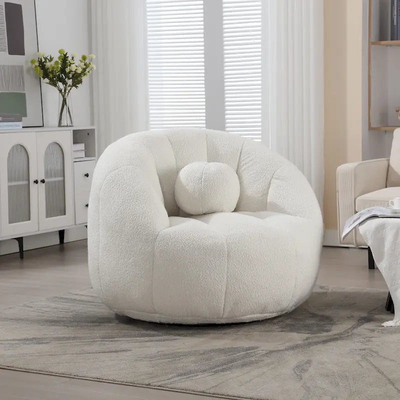 Sillón tipo puf redondo tapizado, de textura suave, para leer