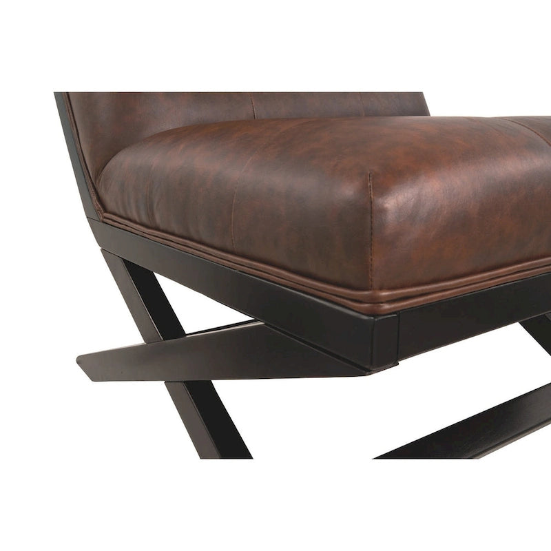 Sillón decorativo marrón de cuero sintético capitoné, sin brazos, con base metálica