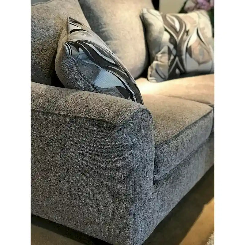 Textured Fabric Loveseat with Rolled Arms and Plush Pillow Back