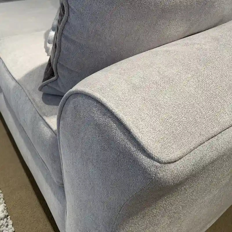 Textured Fabric Loveseat with Rolled Arms and Plush Pillow Back