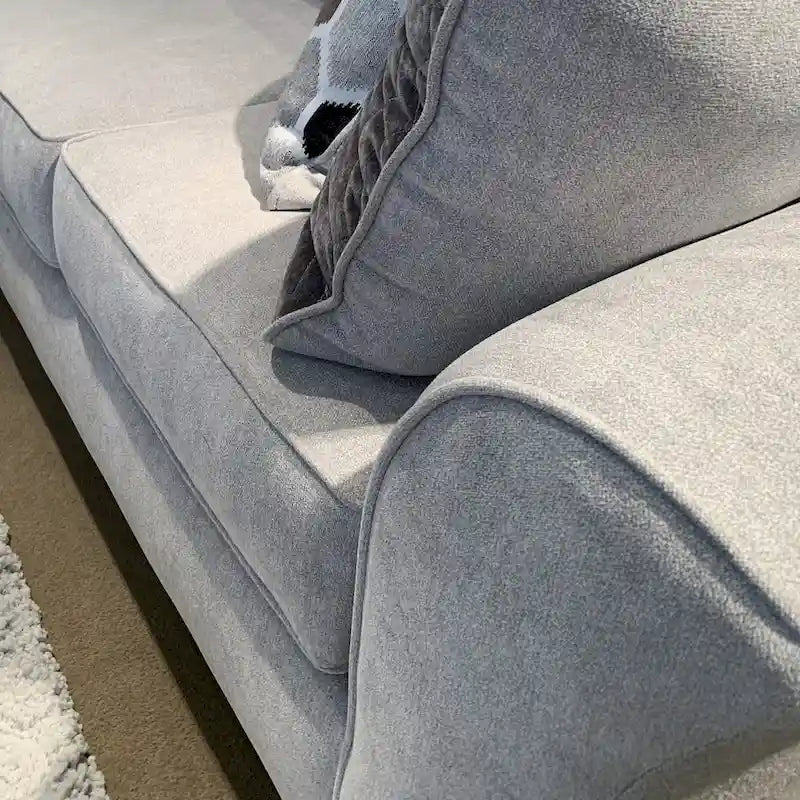 Textured Fabric Loveseat with Rolled Arms and Plush Pillow Back