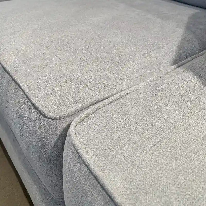 Textured Fabric Loveseat with Rolled Arms and Plush Pillow Back